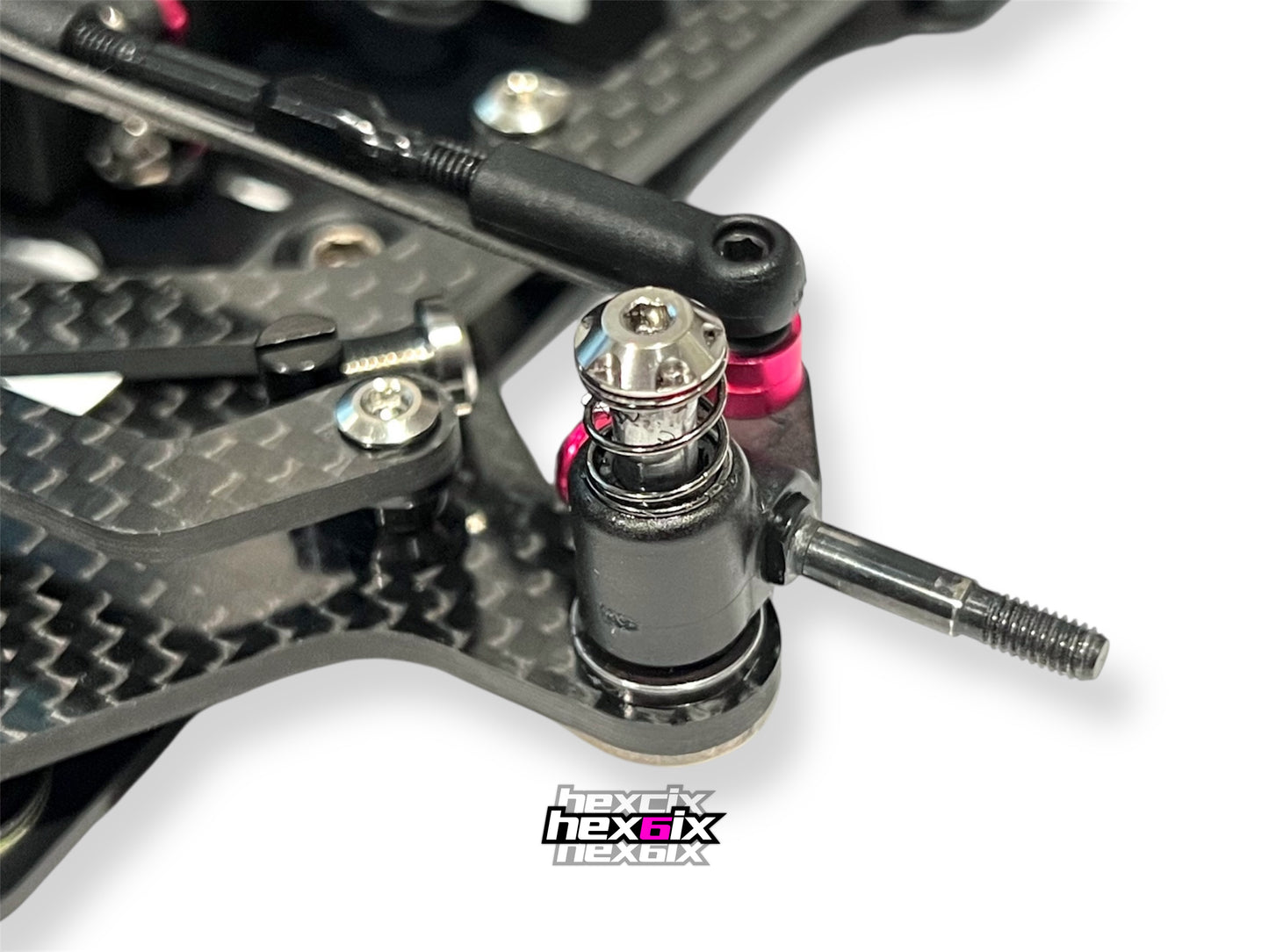 Hexcix King Head M3 titanium screws shown in kingpin position on an RC car front suspension