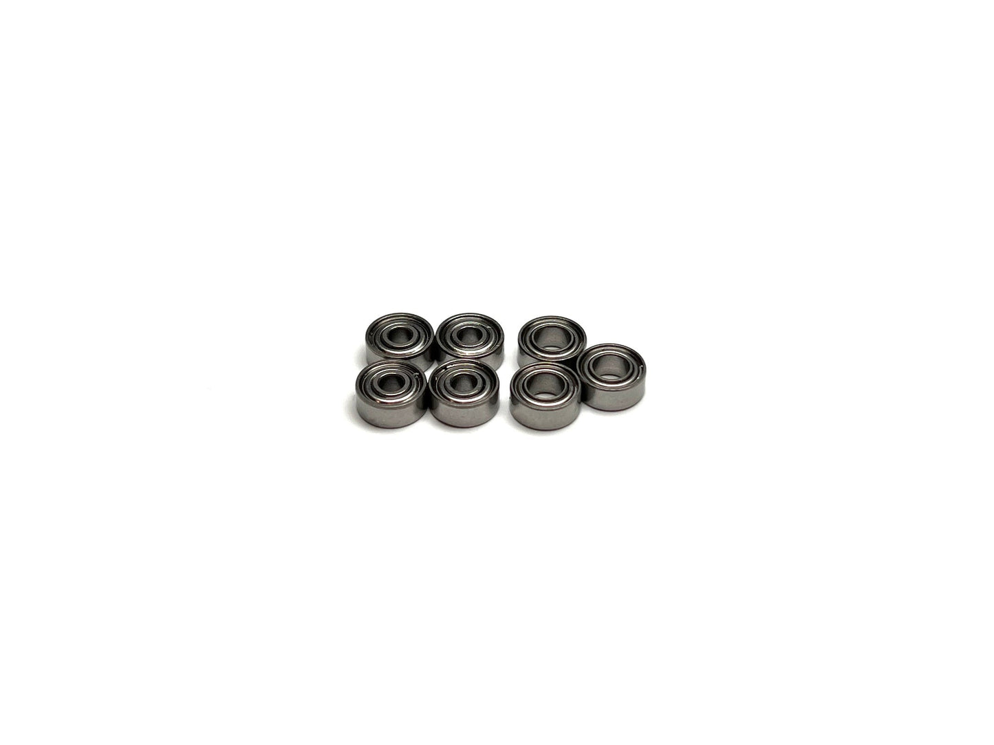 A set of seven hybrid ceramic bearings for the Kyosho MR-03 Mini-Z remote control car.