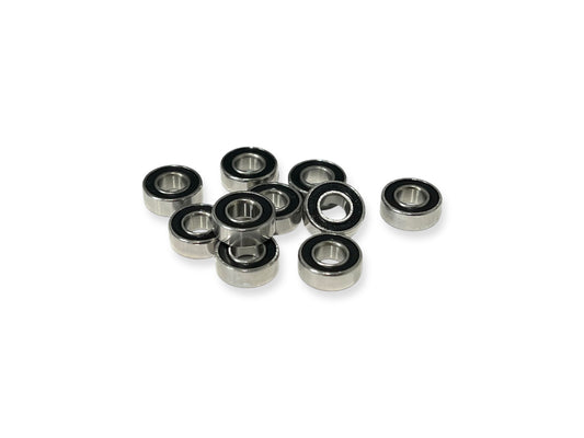 10 pieces of Sortafast 5 x 11 x 4mm stainless steel RC bearings, non-flanged, with black rubber seals, displayed on a white background.