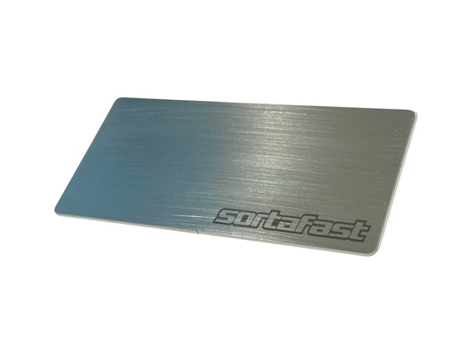 Sortafast 1S / 2S shorty stainless steel battery weight plate – 45x92mm, available in 24g and 39g. Shown on a white background.
