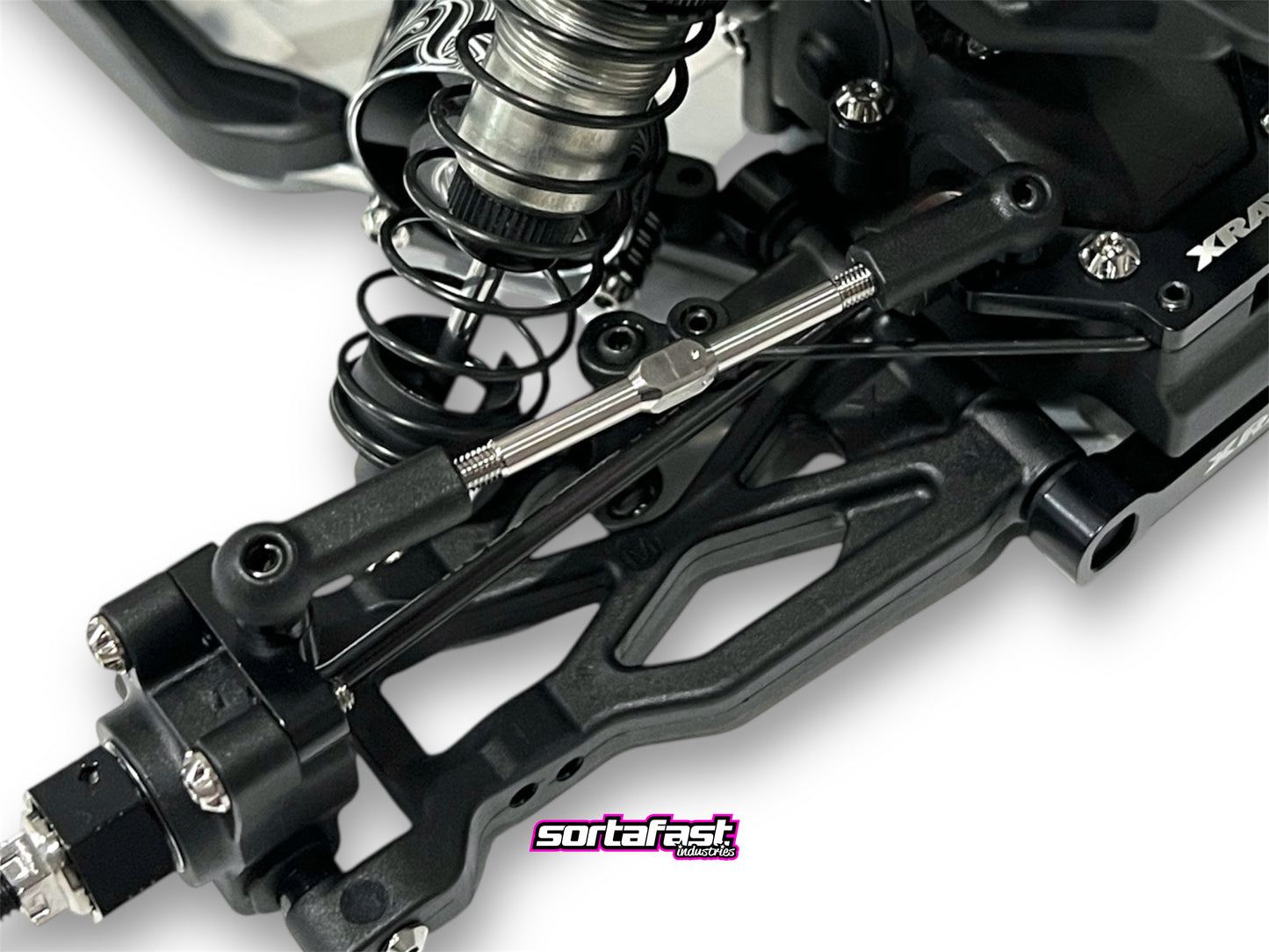 Sortafast 3x55mm titanium turnbuckles installed on RC car chassis.