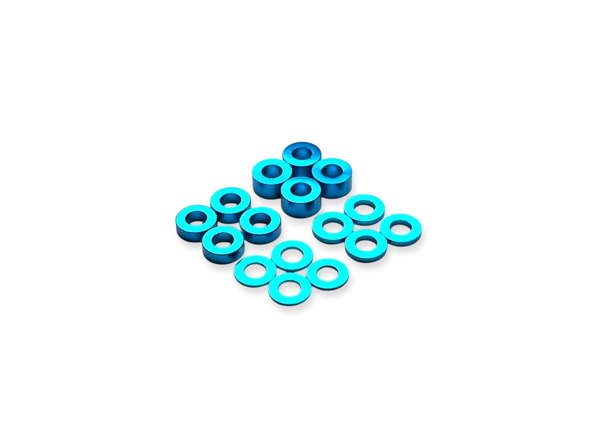 Sortafast 3x6mm aluminum shims in bright blue anodized finish, assorted thicknesses (0.5mm, 1mm, 2mm, 3mm), displayed on a white background – 16-piece pack.