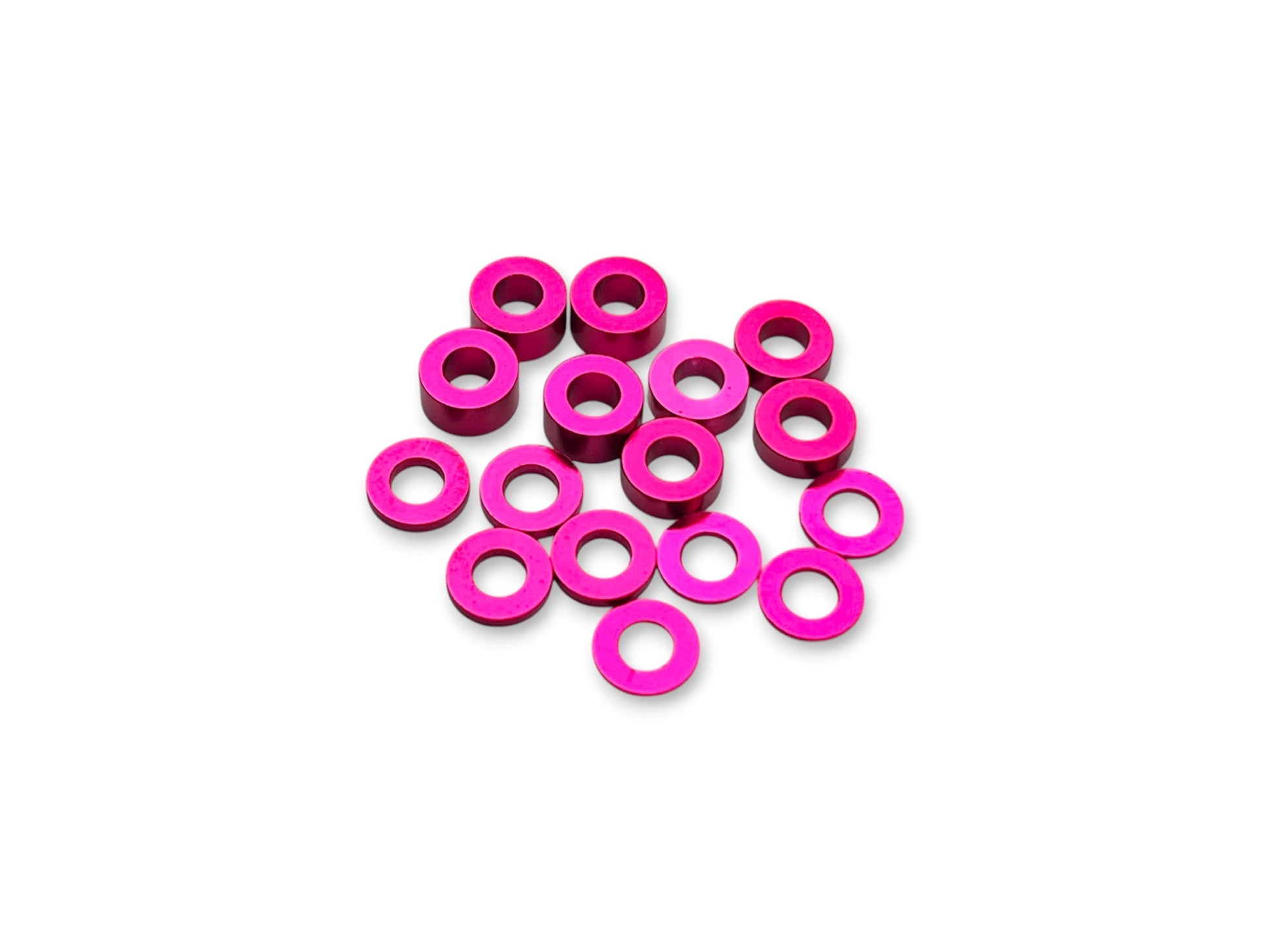Sortafast 3 × 6 mm aluminum shim assortment in hot pink anodized finish, 16-piece kit with multiple thicknesses.
