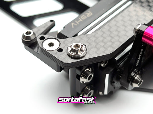 Sortafast titanium button washer shown installed on RC chassis