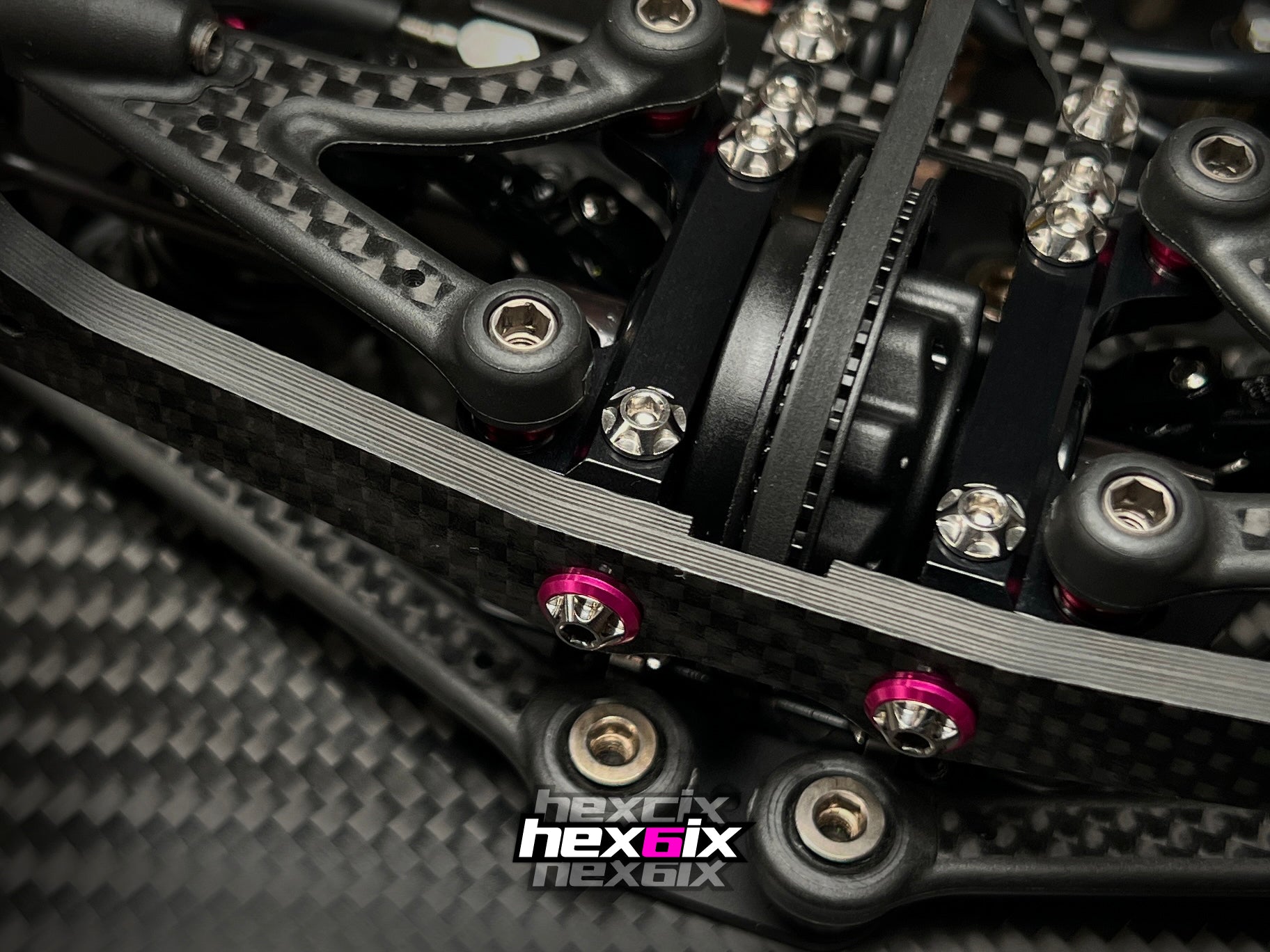 Hexcix M3 titanium screws installed on RC car chassis, showcasing precision fit and aggressive styling