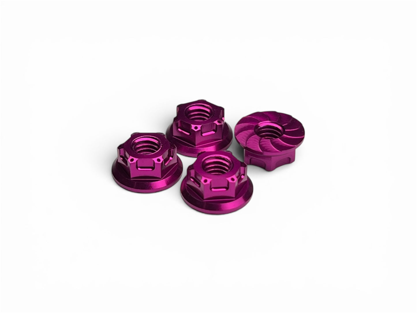 Sortafast M4 Hexcix flanged aluminum RC wheel nuts in natural clear anodized finish with serrated flange, 4-piece pack.