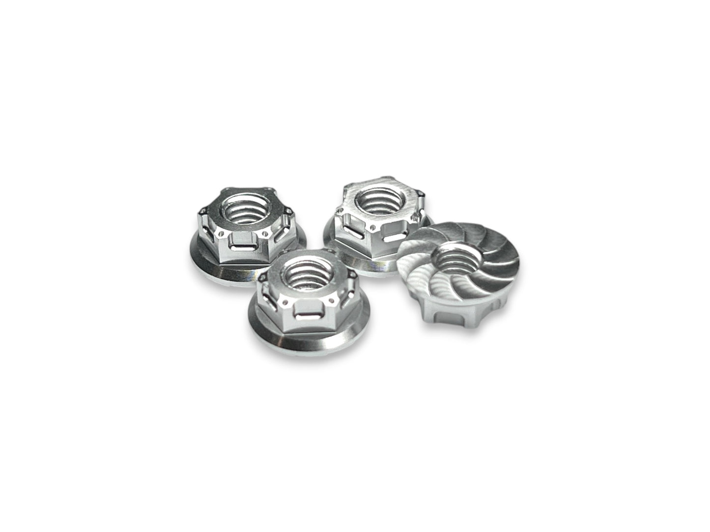 Sortafast M4 Hexcix flanged aluminum nuts in natural clear anodized finish with serrated flange, 4-piece pack.