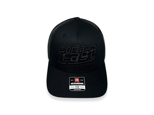 Sortafast "Jacked Up" Trucker Hat – Richardson 112 with black-on-black embroidered logo, front view on white background.