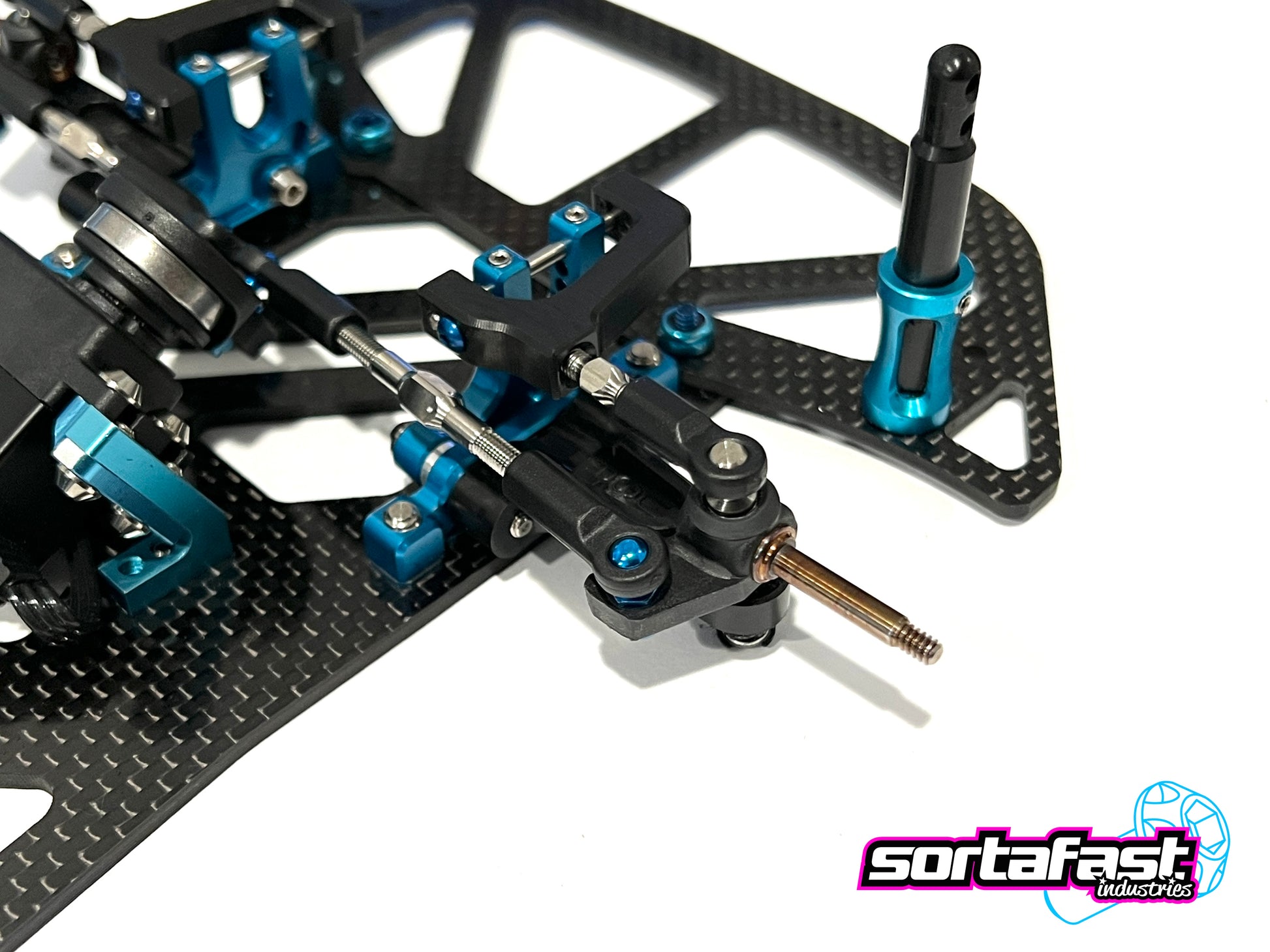 Sortafast 4.3mm molded rod ends shown installed on a 12th scale pan car. 