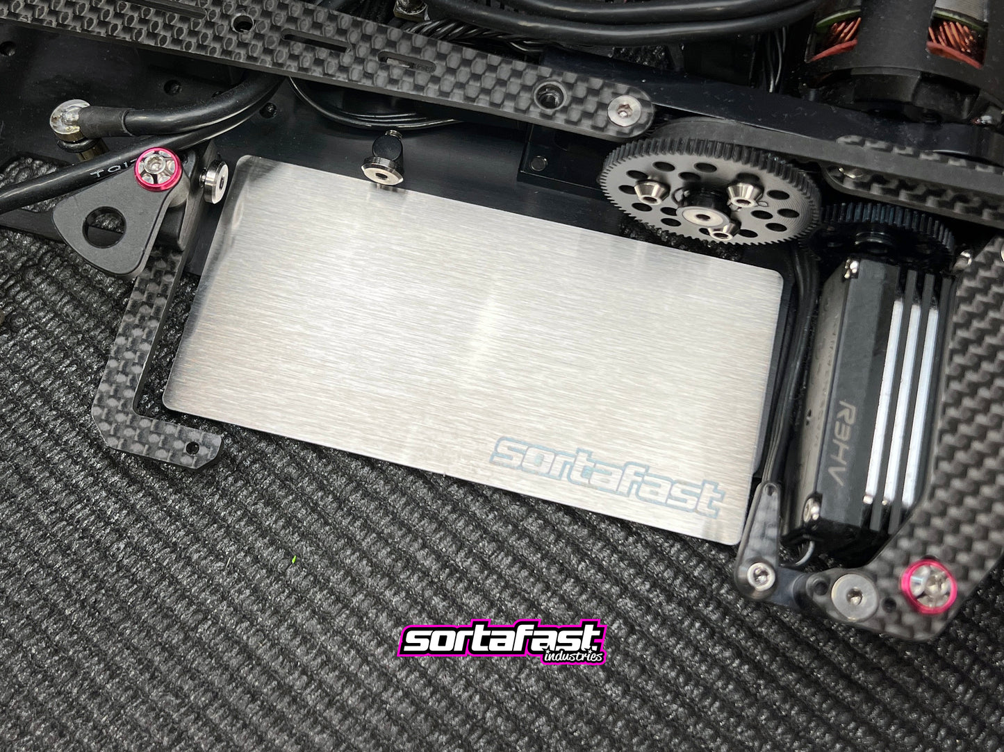 Sortafast stainless steel 1S / 2S shorty battery weight plate installed in RC touring car.