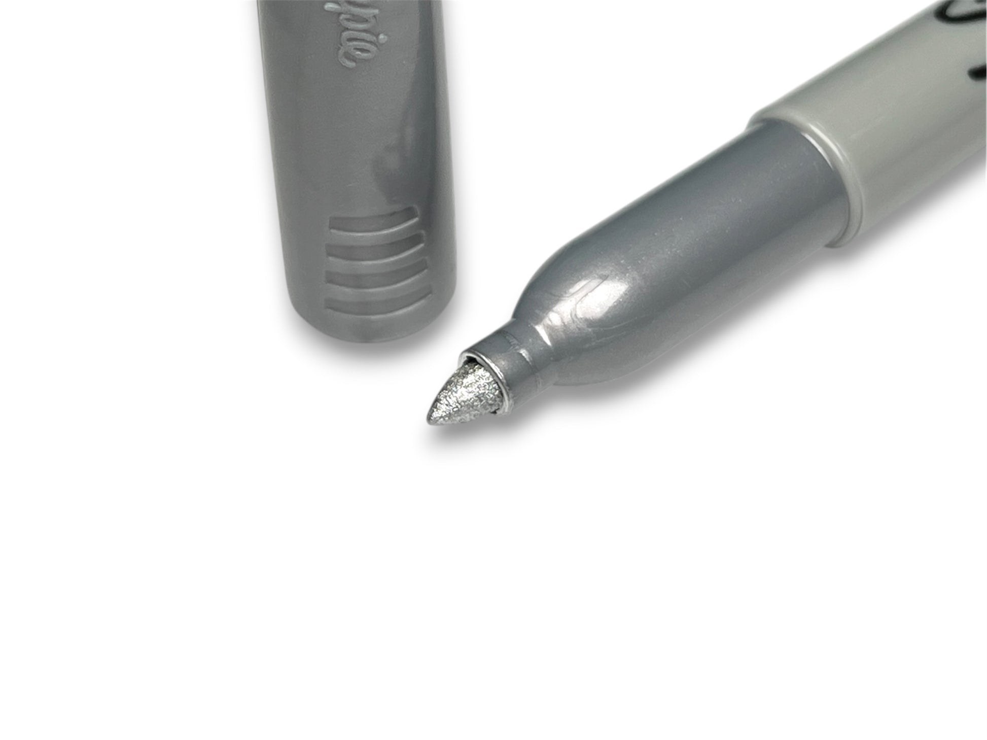 Close-up of a Sharpie marker on a white background